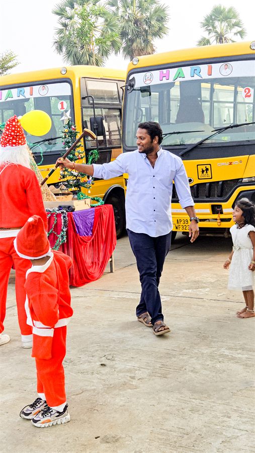 Christmas celebration beside the school buses